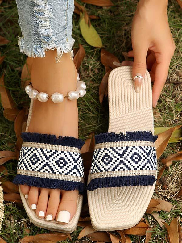 Stylish tassel flat slippers