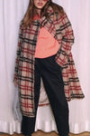 Woman Contrasting Plaid With Elegant Coats