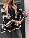 Women's V-neck Printed Trumpet Sleeve Top